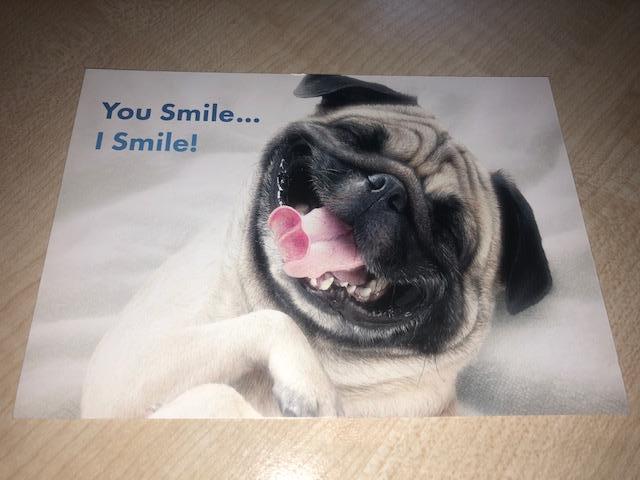 'You Smile. I Smile.' ActionCOACH postcards