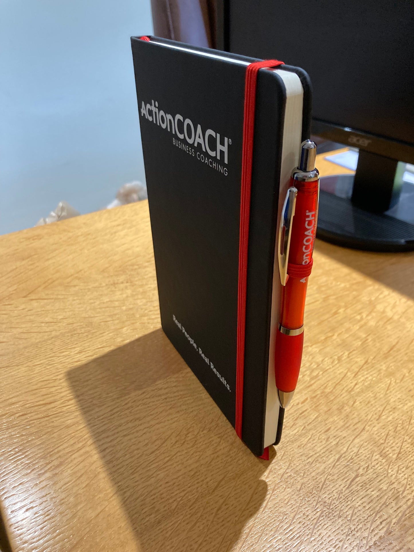ActionCOACH Journal with branded pen