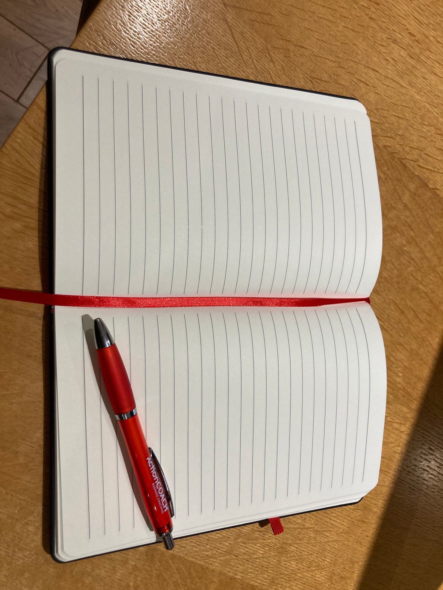 ActionCOACH Journal with branded pen