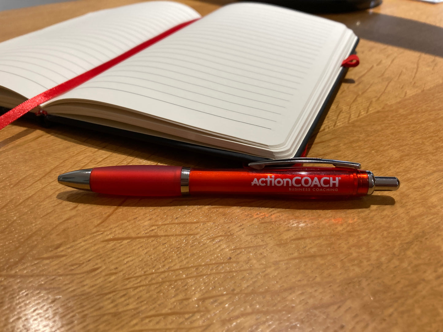 ActionCOACH Journal with branded pen